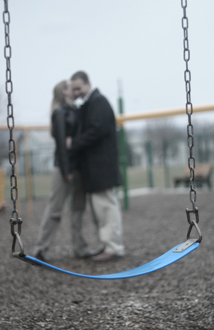 Dan & Kelly behind the swing